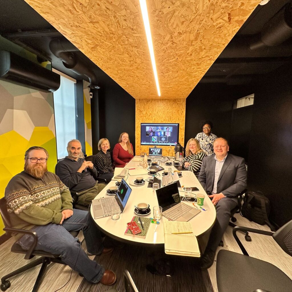 The Learning Network Board sat around a table discussing their work in education and training.